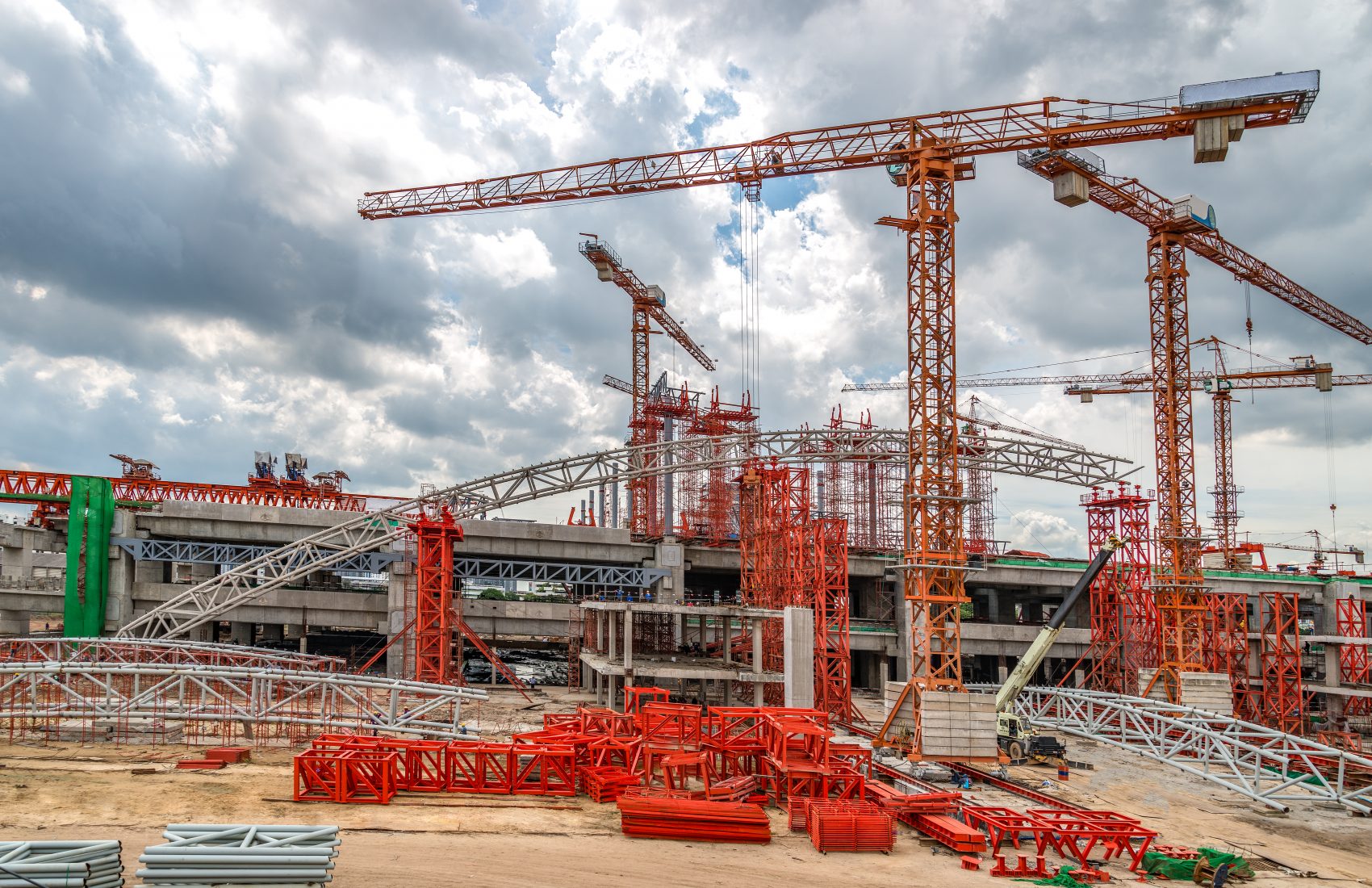 Cranes Working on Expressway Construction Sites in Asia